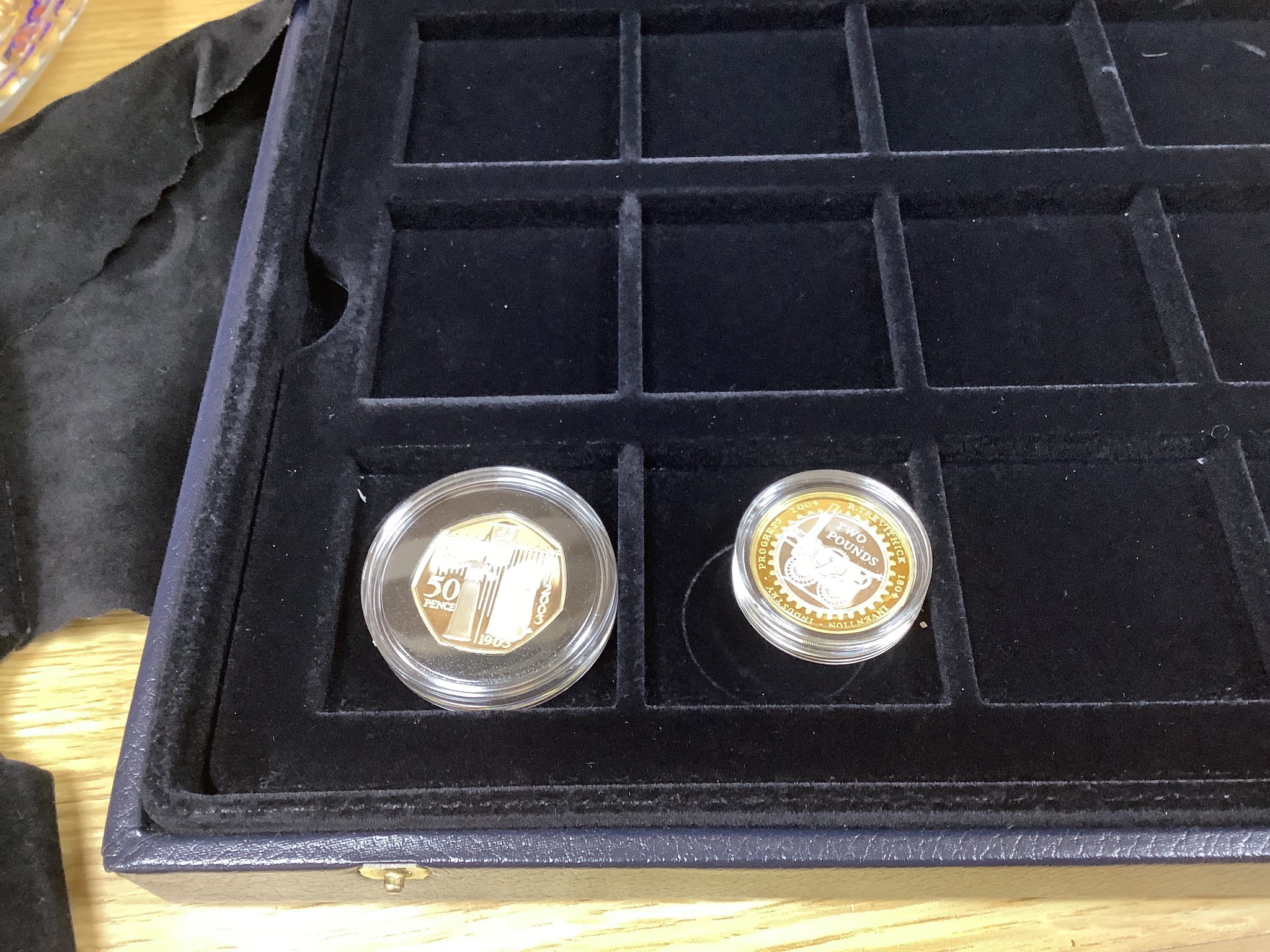 A group of Royal Mint UK commemorative silver proof coins, including 1996 Northern Ireland £1, 1983 royal arms £1, 1995 Welsh £1, 2005 Dictionary 250th anniversary coin, four minute mile 50p, 1997 £2, 50th anniversary D